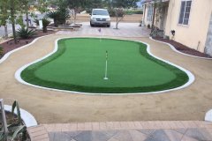 Pavers-and-putting-green-turf-with-curbs-and-D-G